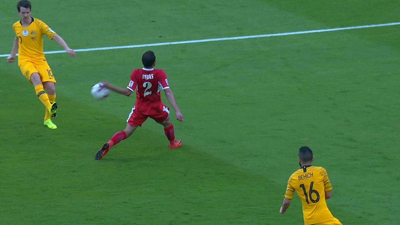 The Socceroos had a handball shout waved away.