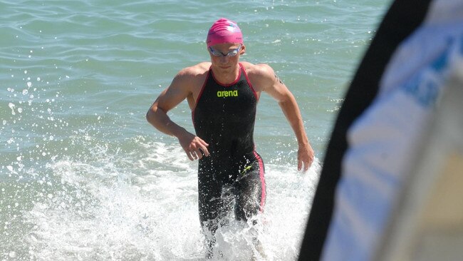 Thomas Raymond leaves the water after an ocean swim.