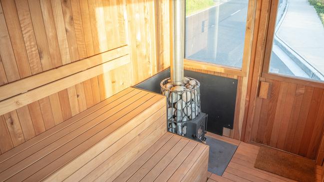 The sauna is heated using logs of wood.