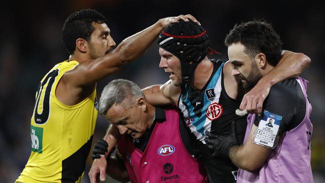 Former Port Adelaide midfielder Brad Ebert suffered a concussion in his final AFL game after a string of head knocks throughout his career.