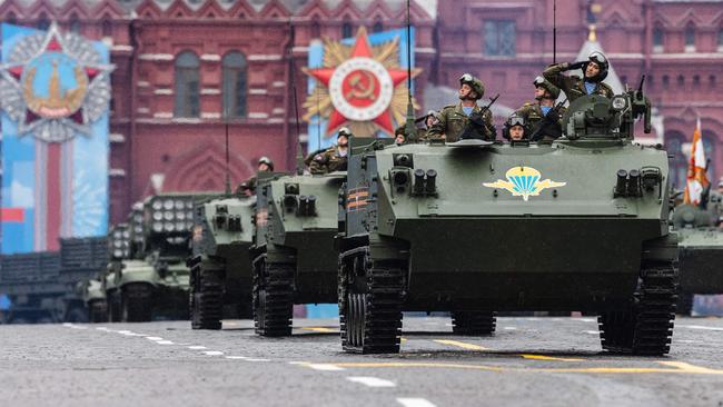 Military vehicles move through Red Square. Picture: AFP