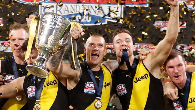 Martin with the 2020 premiership cup and the Norm Smith Medal draped around his neck. Picture: Getty Images