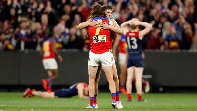 Lions Zac Bailey and Jarrod Berry after the final siren. Picture: Dylan Burns/AFL Photos