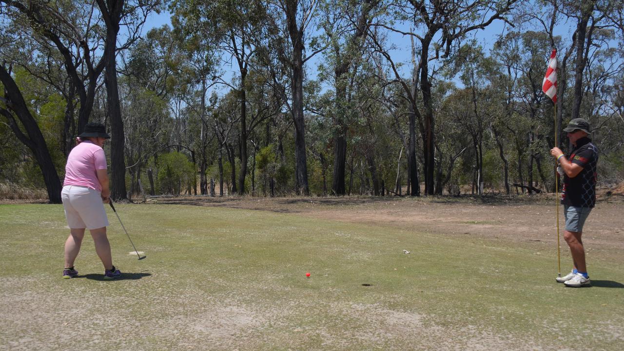 Rebekah Adams takes a shot at the Proston Pink Golf Day on Saturday, November 16. (Photo: Jessica McGrath)