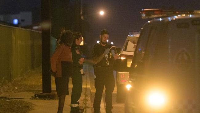 Police outside an industrial complex where a person was shot by a gunman in the suburb of Woolner in Darwin. Picture: AAP