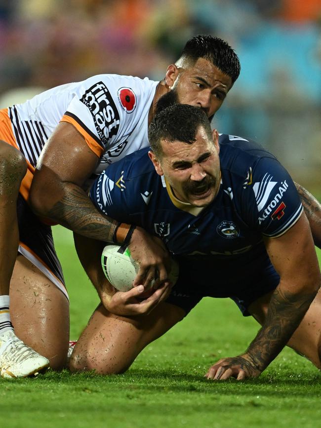 Reagan Campbell-Gillard sustains an injury in a Payne Haas tackle. Picture: NRL Imagery