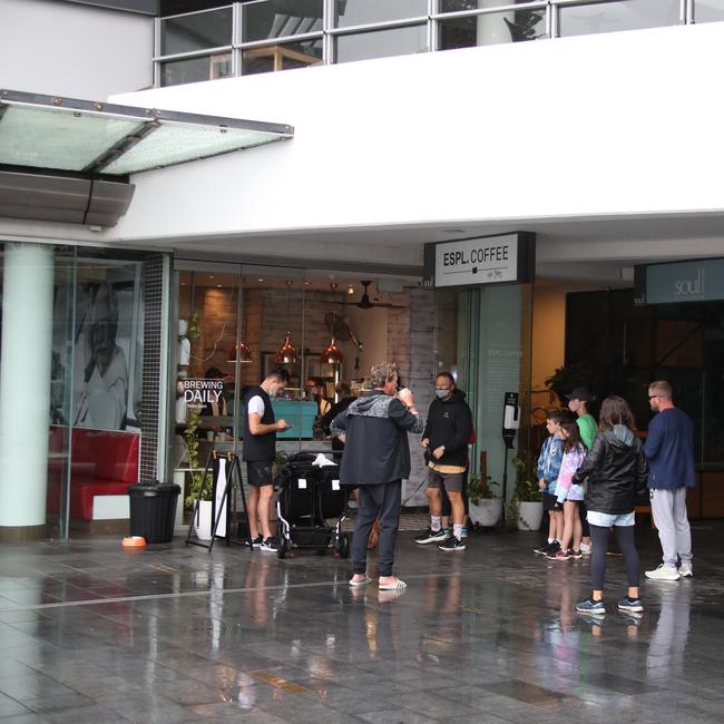Day three of the Gold Coast lockdown.Large queue for Coffee at Surfers Paradise. . Picture Glenn Hampson