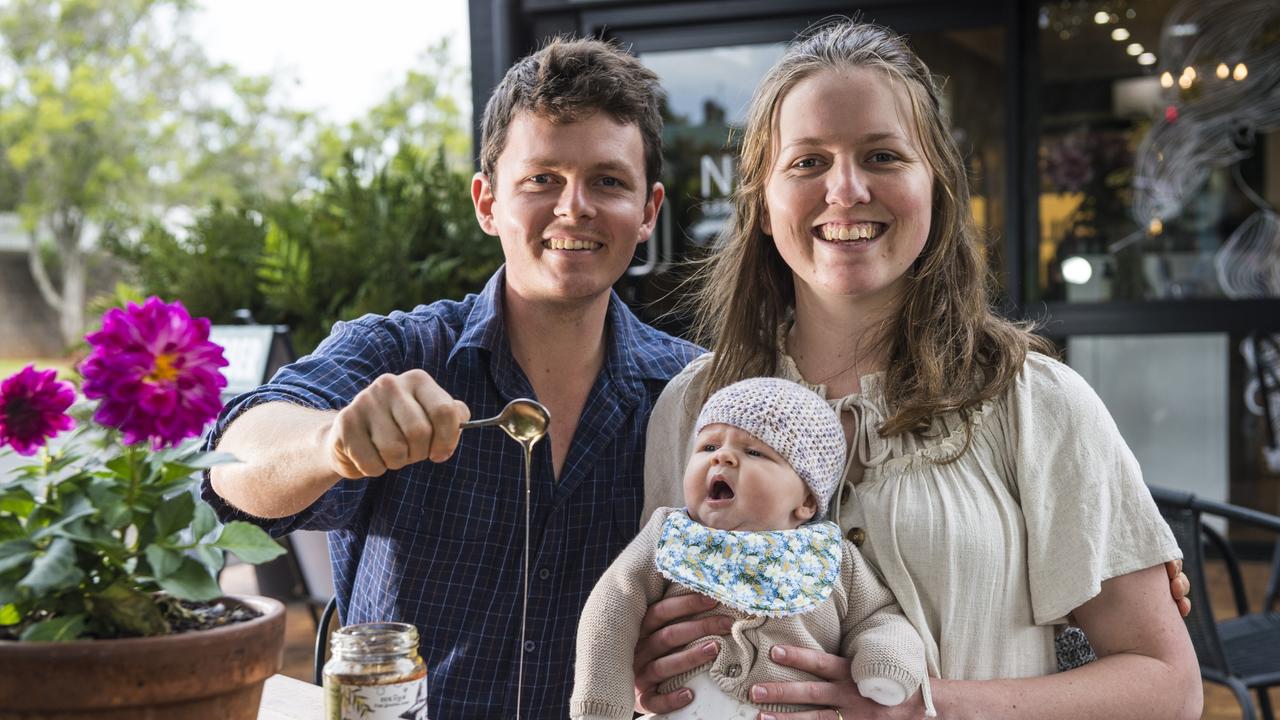 BUZZING BUSINESS: Excited about what the future holds after launching new Toowoomba business Hope Honey are owners Tony and Kristina Duff with their baby daughter Rebekah Duff. Picture: Kevin Farmer