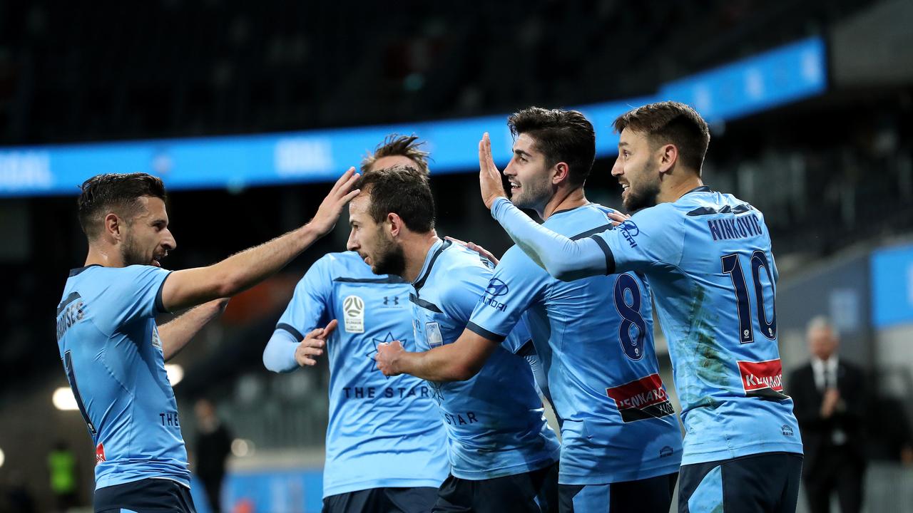 Adam Le Fondre is congratulated by teammates after scoring one of his many goals for Sydney FC. Picture: Phil Hillyard