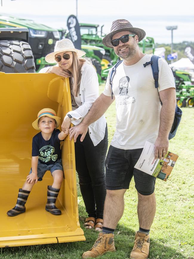 Felix, Megan and Deakin Frawley check out the tractors. Toowoomba Royal Show. Friday, March 31, 2023. Picture: Nev Madsen.