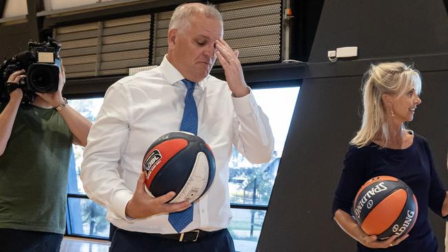 Mr Morrison takes time out to rub his forehead. Picture: Jason Edwards