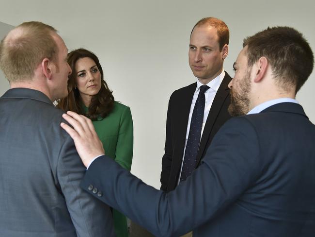 The Duke and Duchess of Cambridge with Jonny Benjamin and his 'guardian angel' Neil Laybourn. Picture: Toby Melville