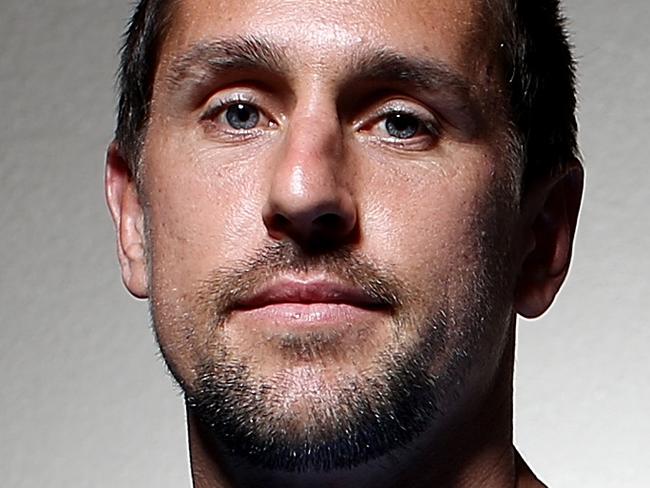 COFFS HARBOUR, AUSTRALIA - MAY 20: Mitchell Pearce poses after a team photograph for the New South Wales Blues State of Origin team at Novotel Coffs Harbour on May 20, 2015 in Coffs Harbour, Australia. (Photo by Chris Hyde/Getty Images)