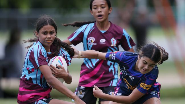 Titans Schools League at Burleigh Bears Junior Rugby League. Year 7/8 Division 1 girls:Keebra Park v Mabel Park .Keebras Tahiah Anderson spins out of a tackle.. Picture Glenn Hampson