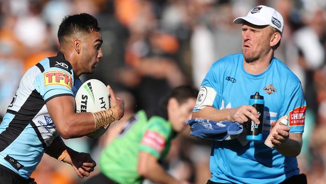 Briton Nikora runs into a West Tigers trainer. Picture: Brett Costello