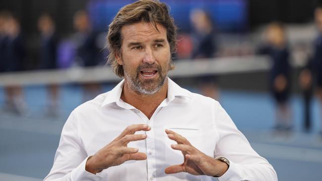 Pat Rafter speaks to media inside the stadium named in his honour in Brisbane. Photo by Glenn Hunt/Getty Images for Tennis Australia.