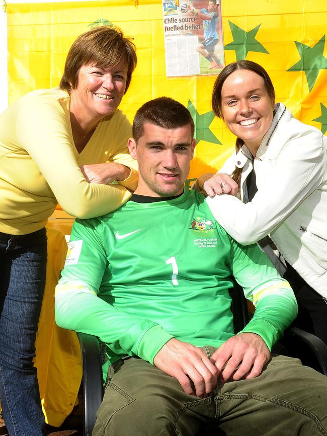 Mat Ryan with his mum Carol Ryan (left) and his sister Megan Ryan (right) at home in Shalvey on Sunday. Picture: John Appleyard