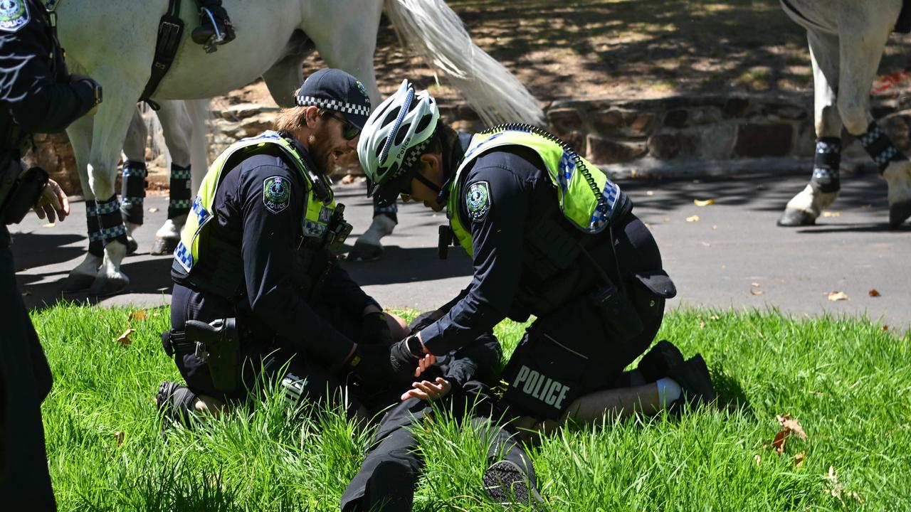 The alleged members of the National Socialist Network (NSN) were arrested as they held a counter protest in Rymill Park on North Terrace. Picture: Tracey Nearmy/Getty Images