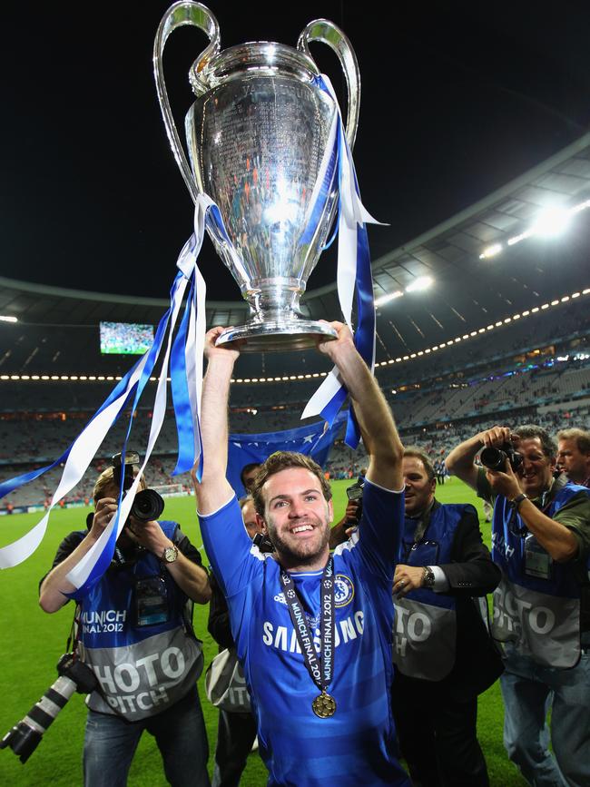 Juan Mata lifts the Champions League trophy. Photo by Alex Livesey/Getty Images