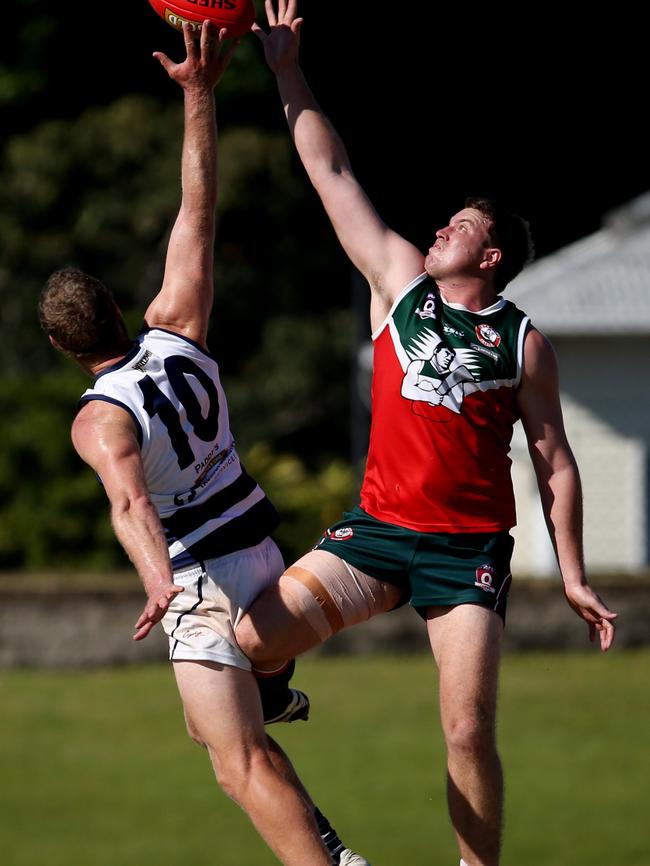 AFL Cairns 2019 AFL Cairns Seniors Semi Final between Port Douglas and South Cairns at Cazalys Stadium. Crocs' Adam Boone and Cutters' Shane Williams. PICTURE: STEWART MCLEAN