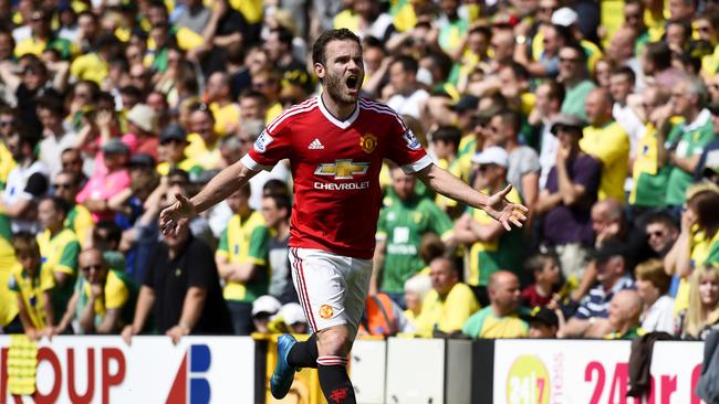 Juan Mata of Manchester United celebrates scoring his team's only goal against Norwich.