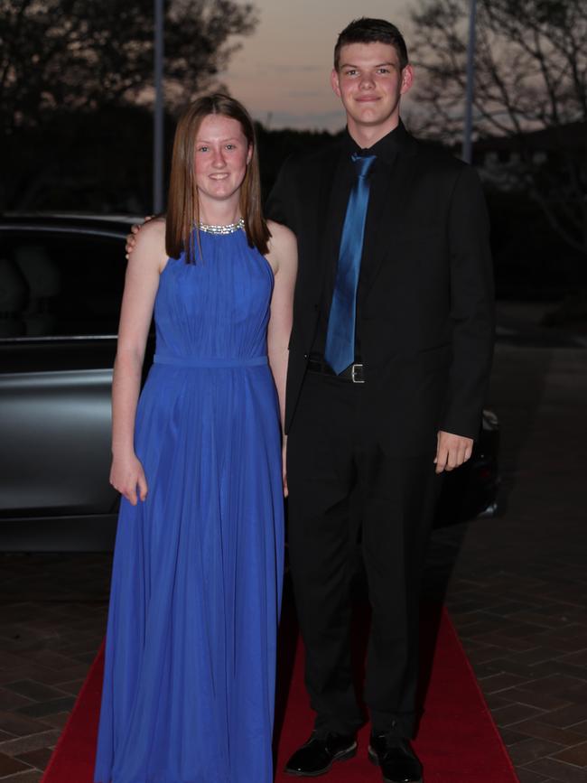 Ben Newton, 17, and Charlotte Doyle, 17, at the Ormeau Woods School formal at Links Resort, Hope Island. Picture: Glenn Hampson
