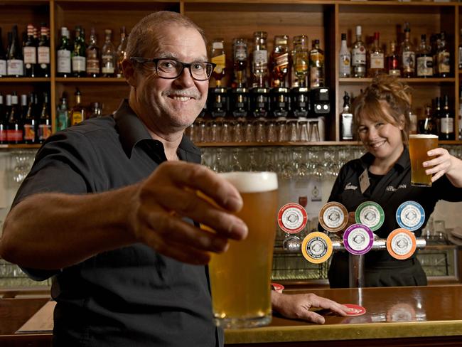 ADELAIDE, AUSTRALIA - NewsWire Photos NOVEMBER 9, 2021: Manager of The Hotel Metropolitan Damian Peterson would like to see staff COVID vaccines made mandatory. He is pictured with fully vaccinated staff member Malou Helder in his hotel on Grote Street in the CBD. Picture: NCA NewsWire / Naomi Jellicoe