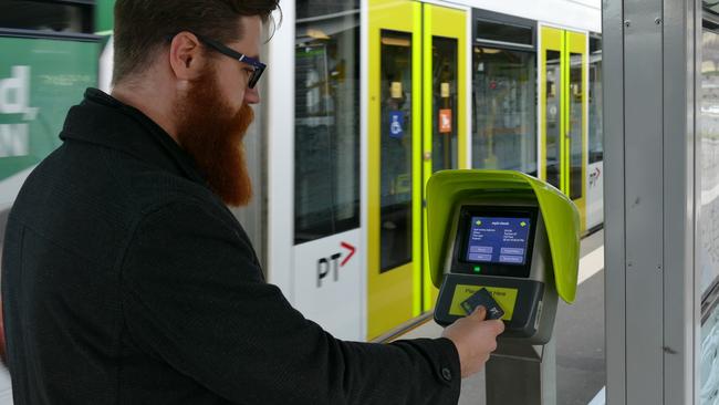 A myki quick top up machine in action at Domain Interchange.