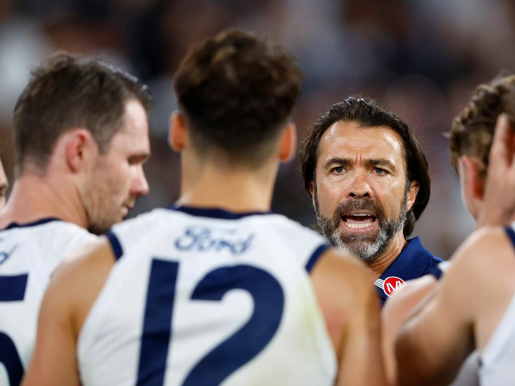 MELBOURNE, AUSTRALIA – MARCH 23: Chris Scott, Senior Coach of the Cats addresses his players during the 2023 AFL Round 02 match between the Carlton Blues and the Geelong Cats at the Melbourne Cricket Ground on March 23, 2023 in Melbourne, Australia. (Photo by Dylan Burns/AFL Photos via Getty Images)