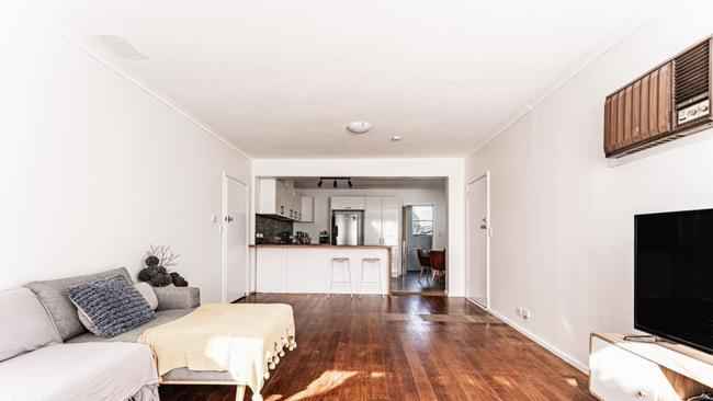 Light-filled living meets modern updates — timber floors, an open-plan layout, and a renovated kitchen made this home a standout for buyers at auction.