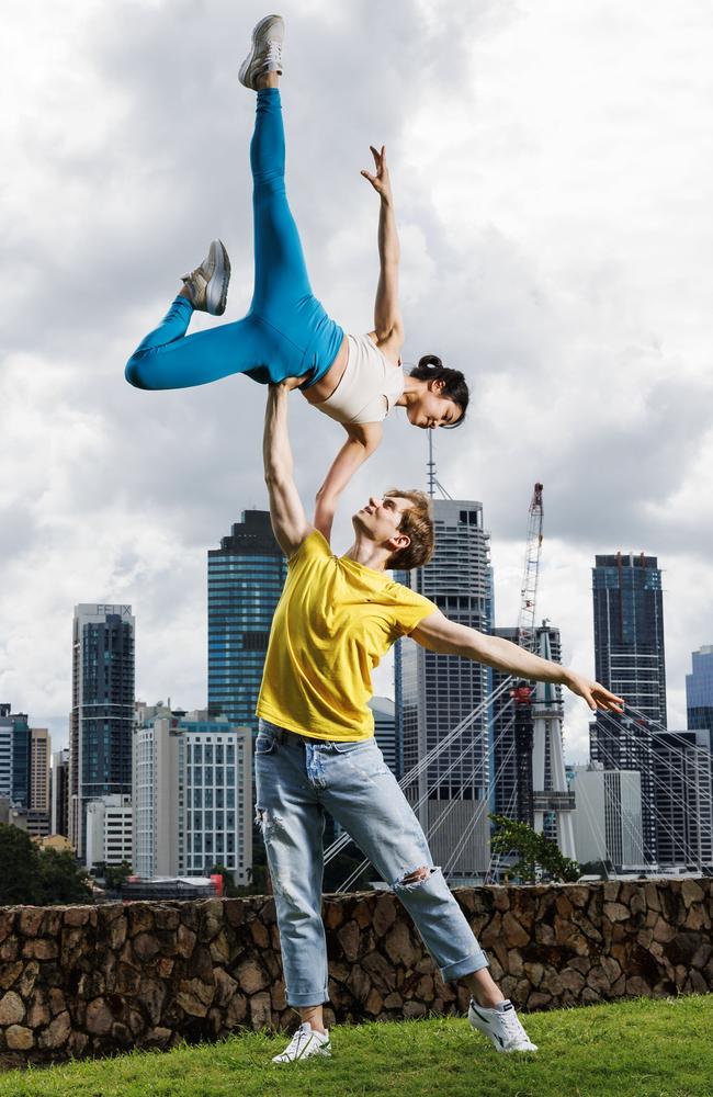 Grand Kyiv Ballet principal soloists Mie Nagasawa and Viktor Tomashek stand at Kangaroo Point. Their performances in Queensland have been postponed because their costumes and sets are currently in quarantine. Picture: Lachie Millard