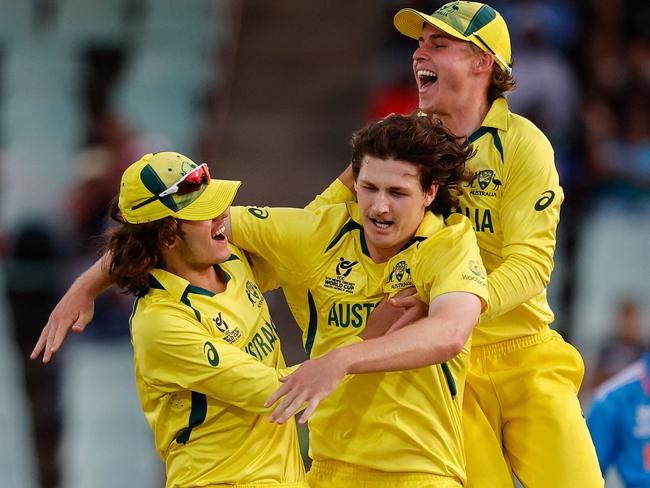 Australia players celebrate winning the under-19 World Cup youth one-day international (YODI) final between India and Australia at Willowmoore Park in Benoni on February 11, 2024. (Photo by PHILL MAGAKOE / AFP)