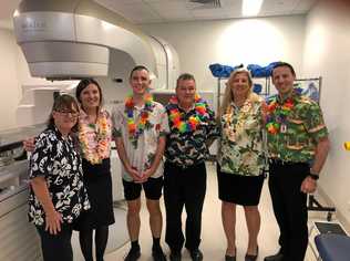 FINAL BELL: Jay Cameron (third from left) with Icon Cancer Centre staff (from left) Kate Harford and Jaimi Dawson, Dr Michael Collins, his mother Jodie Cameron and Icon site manager Brock Ditton. Picture: Contributed