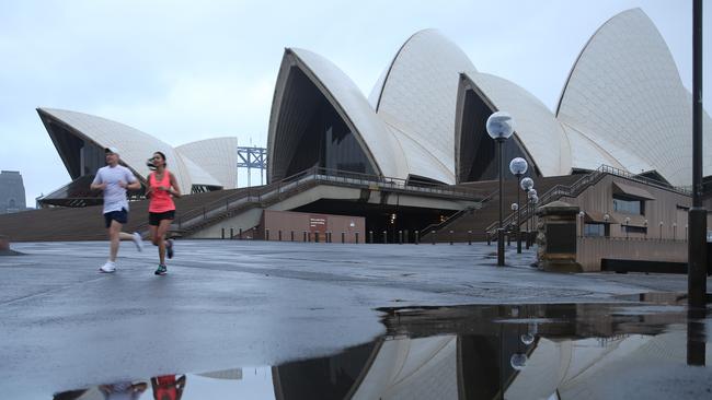 Puddles at the Opera House. Picture: John Grainger