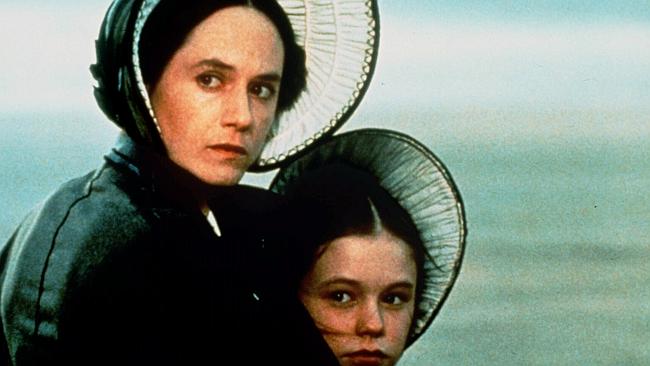 Holly Hunter with Anna Paquin in scene from film "The Piano".