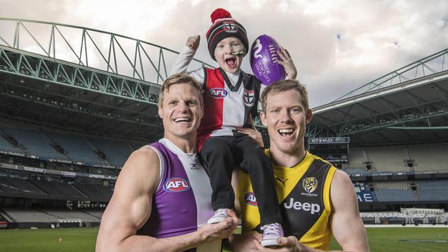 Nick and Jack Riewoldt with four-year-old Elliott Vanderland who is diagnosed with aplastic anaemia. Picture: Jason Edwards