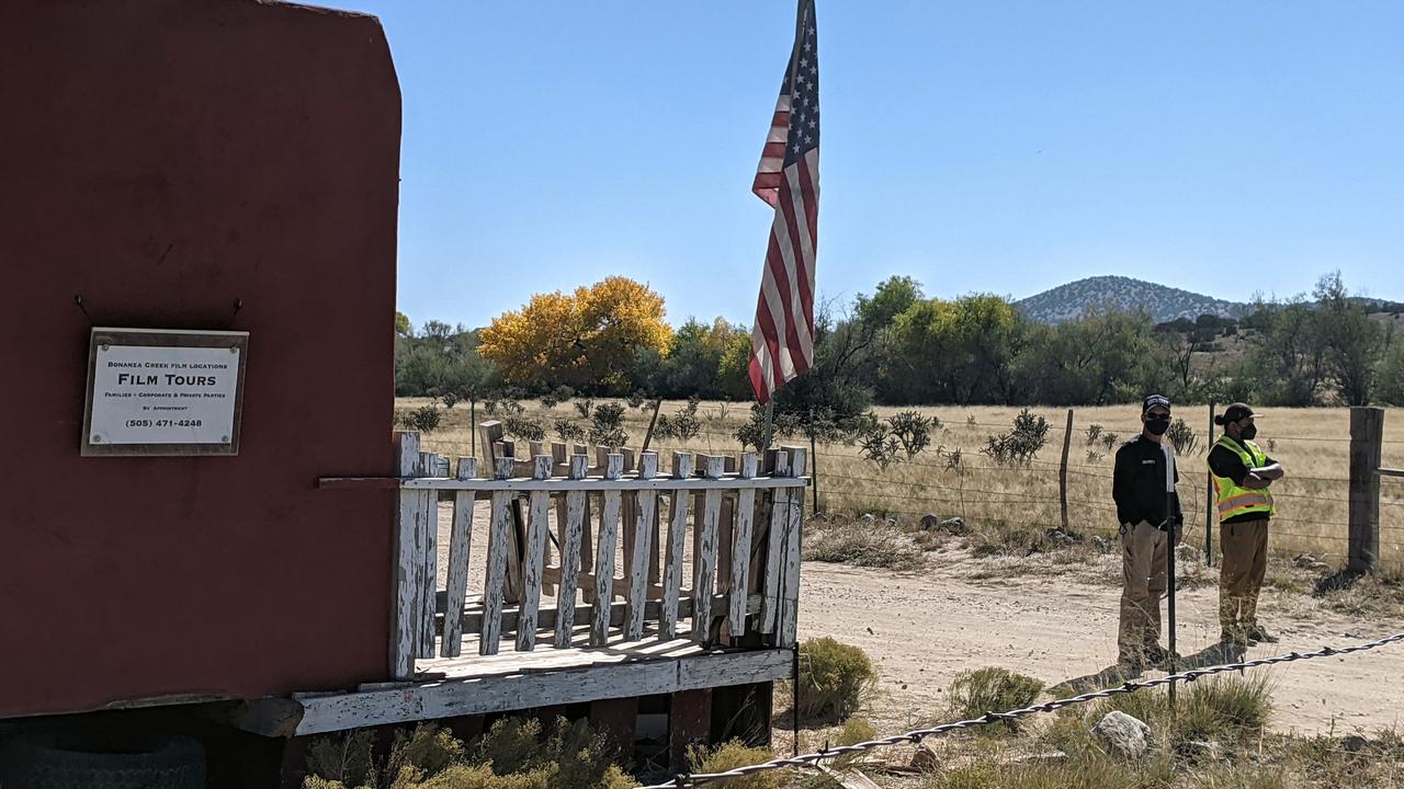 Security guards stand at the entrance of Bonanza Creek Ranch in Santa Fe, New Mexico. Picture: Anne Lebreton / AFP