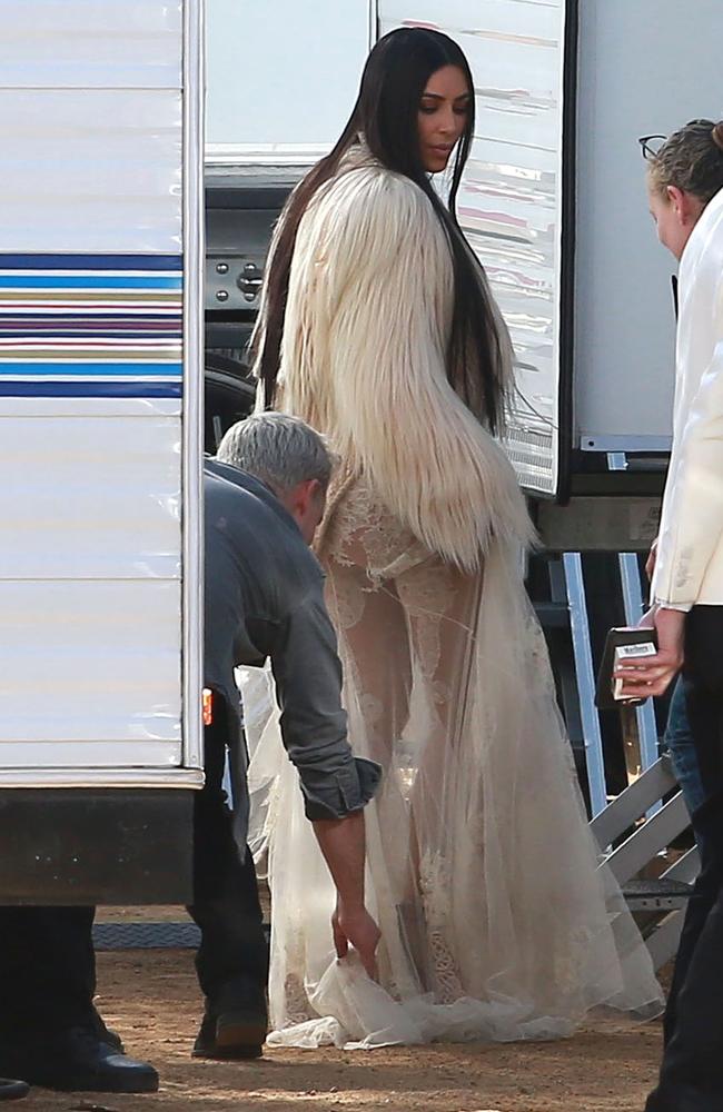 The dress had intricate lace detailing down her legs.