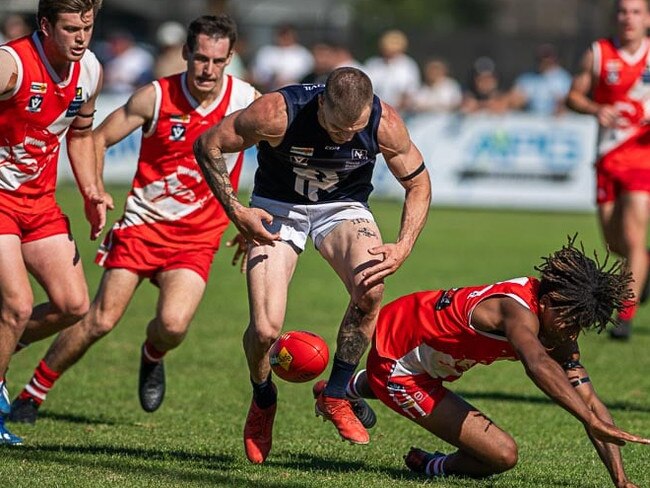 Rosebud's Jai Hardwick goes after the ball against Sorrento. Picture: David Caspar