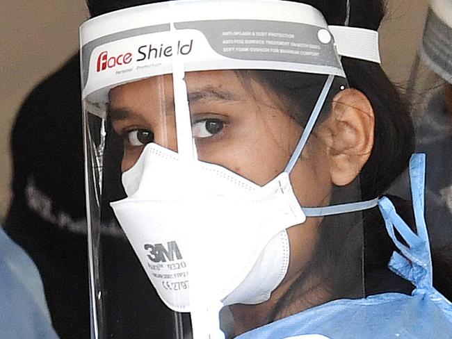 BRISBANE, AUSTRALIA - NewsWire Photos - SEPTEMBER 30, 2021.Health workers perform duties at a drive through Covid-19 testing clinic at Murarrie in Brisbane. Picture: NCA NewsWire / Dan Peled