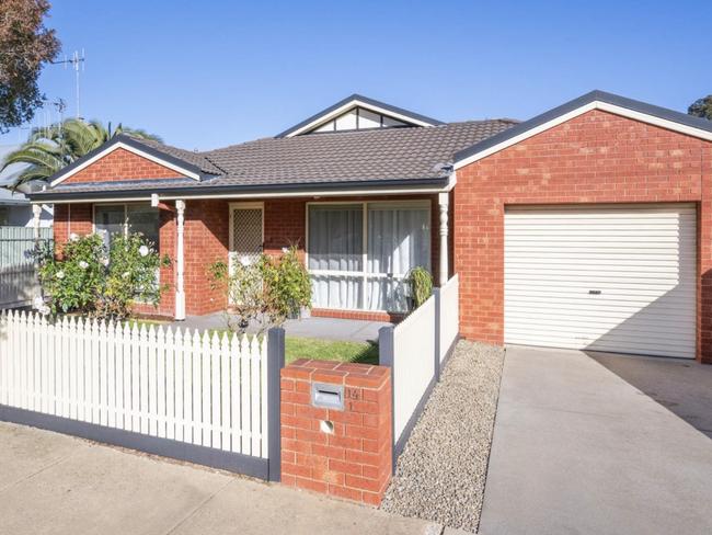 A two-bedroom, one-bathroom unit at 1/14 Glenlyon Avenue, Shepparton has a price guide of $450,000. The home is listed by Shepparton Real Estate's Hollie Wood - for Herald Sun Real Estate.