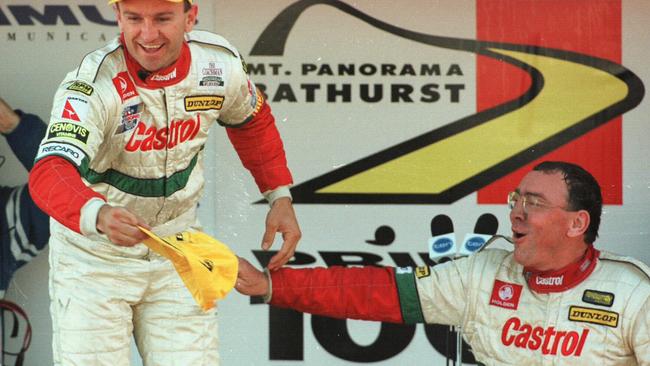 Larry Perkins (r) celebrating his victory with co-driver Russell Ingall.