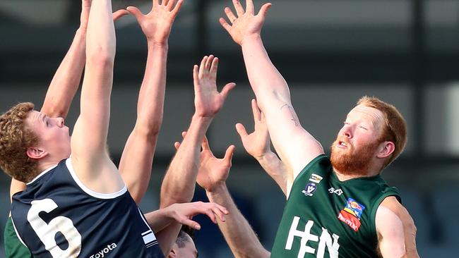 Ballarat and Hampden players try to get the ball. Picture Yuri Kouzmin