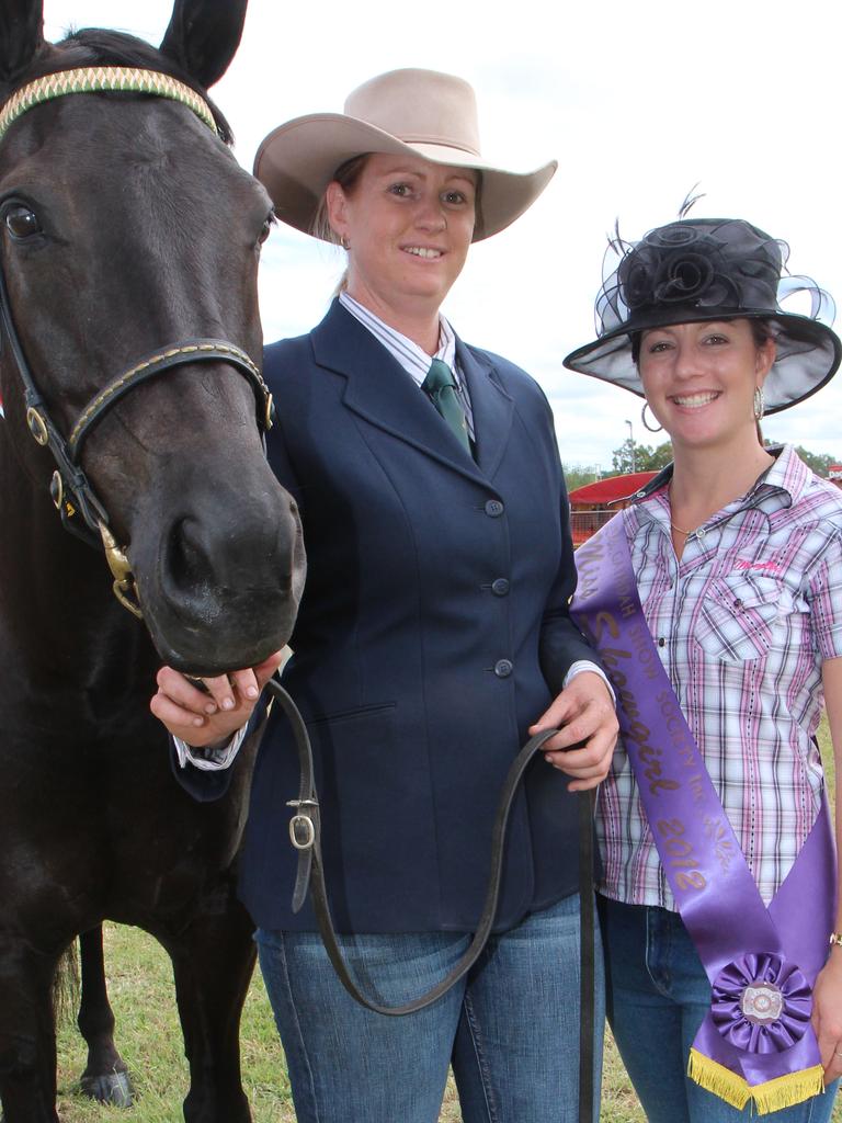 Belinda Staib from Coalstoun Lakes was congratulated by 2012 Gayndah Miss Showgirl Amy Hampson when her mare Rainy Acres by Rambler KD Acres won the Supreme Champion Led Exhibit of 2012. Photo Rose Reed / Central &amp; North Burnett Times