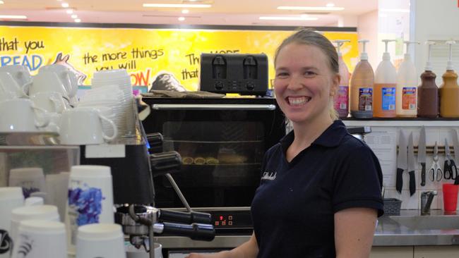 MICHEL’S REOPEN: Karen Jerram serving up coffees and sausage rolls at Dalby Shoppingworld