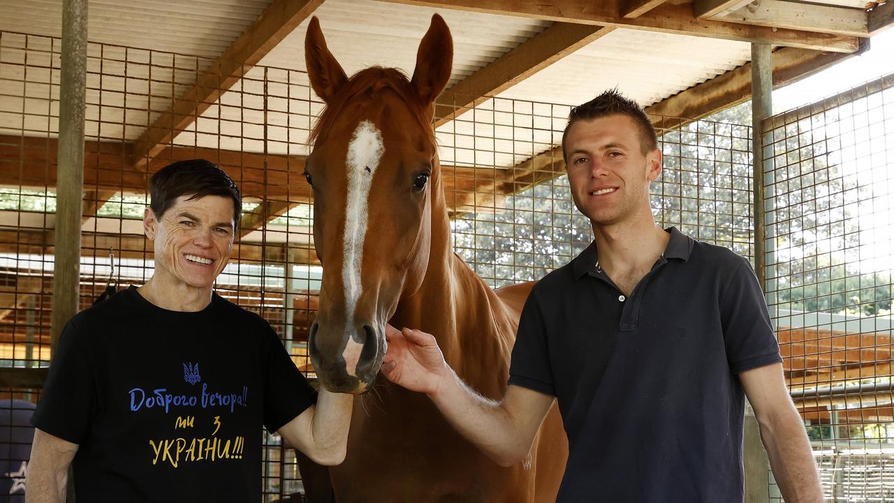 The Everest winner Giga Kick with trainer Clayton Douglas (right) and jockey Craig Williams the morning after his surpise win. Picture: Jonathan Ng