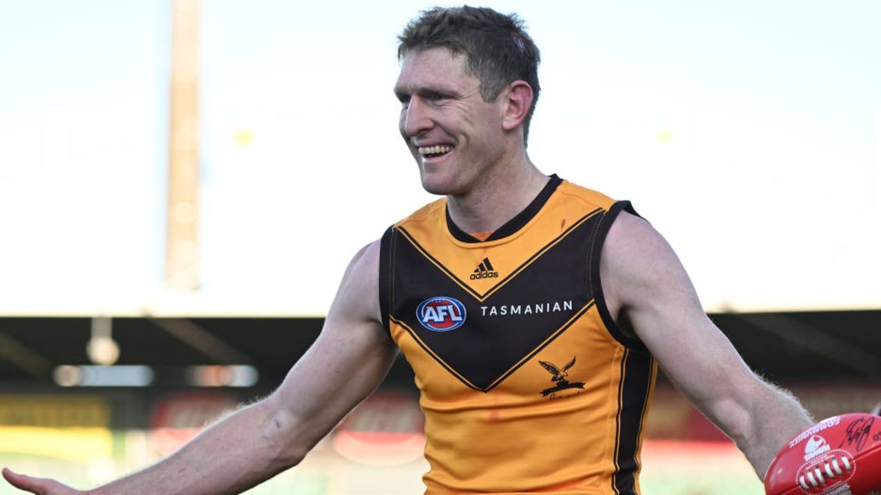 LAUNCESTON, AUSTRALIA - AUGUST 06: Ben McEvoy of the Hawks celebrates the win during the round 21 AFL match between the Hawthorn Hawks and the Gold Coast Suns at University of Tasmania Stadium on August 06, 2022 in Launceston, Australia. (Photo by Steve Bell/Getty Images)