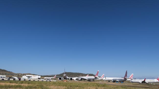 Virgin planes are stored at Wellcamp Airport as the coronavirus pandemic grounds aircraft fleet. Picture: Kevin Farmer