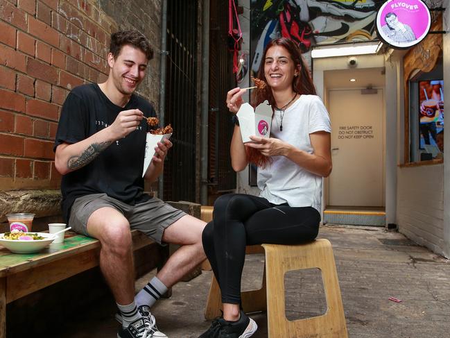 Martyn Bechara and Fanny Prouers enjoying the Indian street food. Picture: Justin Lloyd