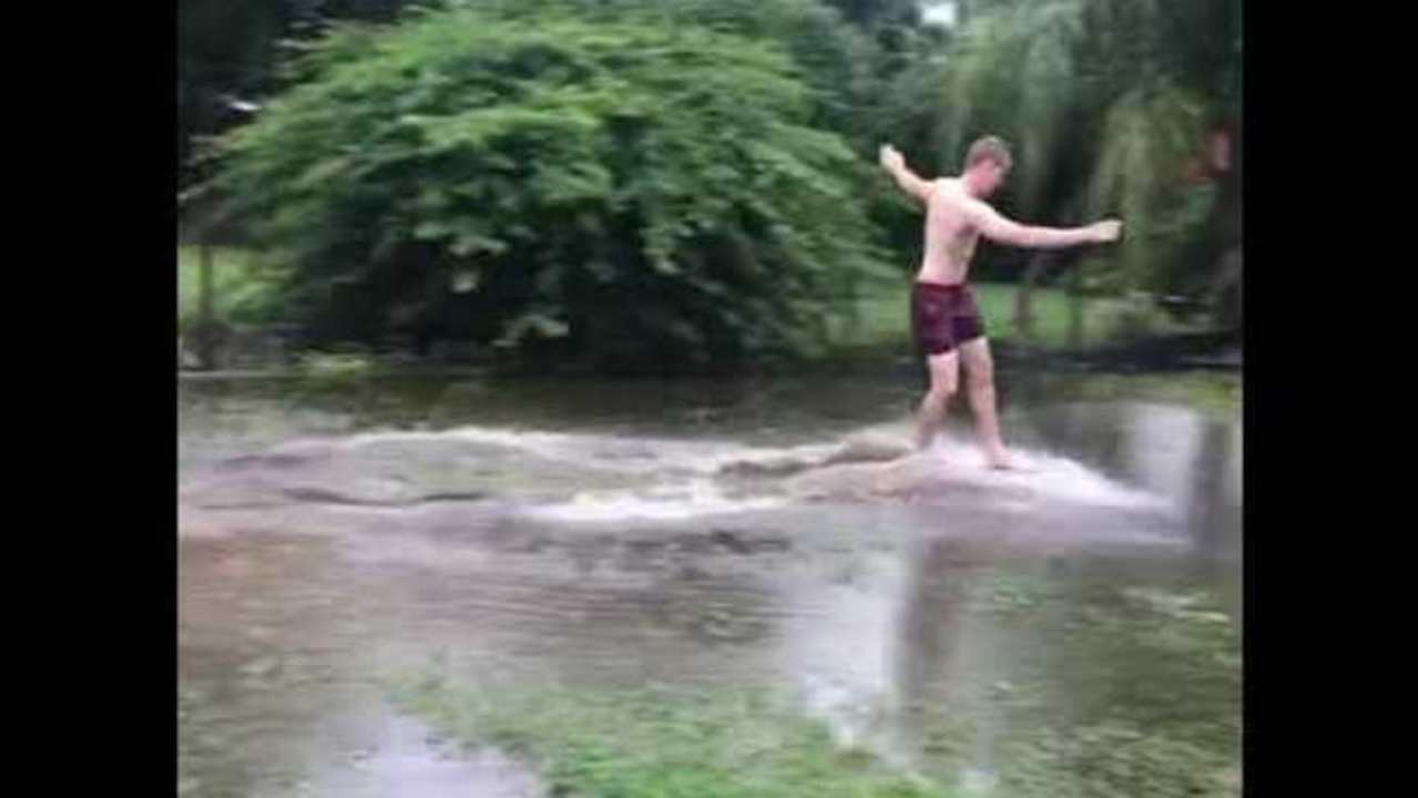 Surfer Drops In To Backyard Break After Queensland Floods